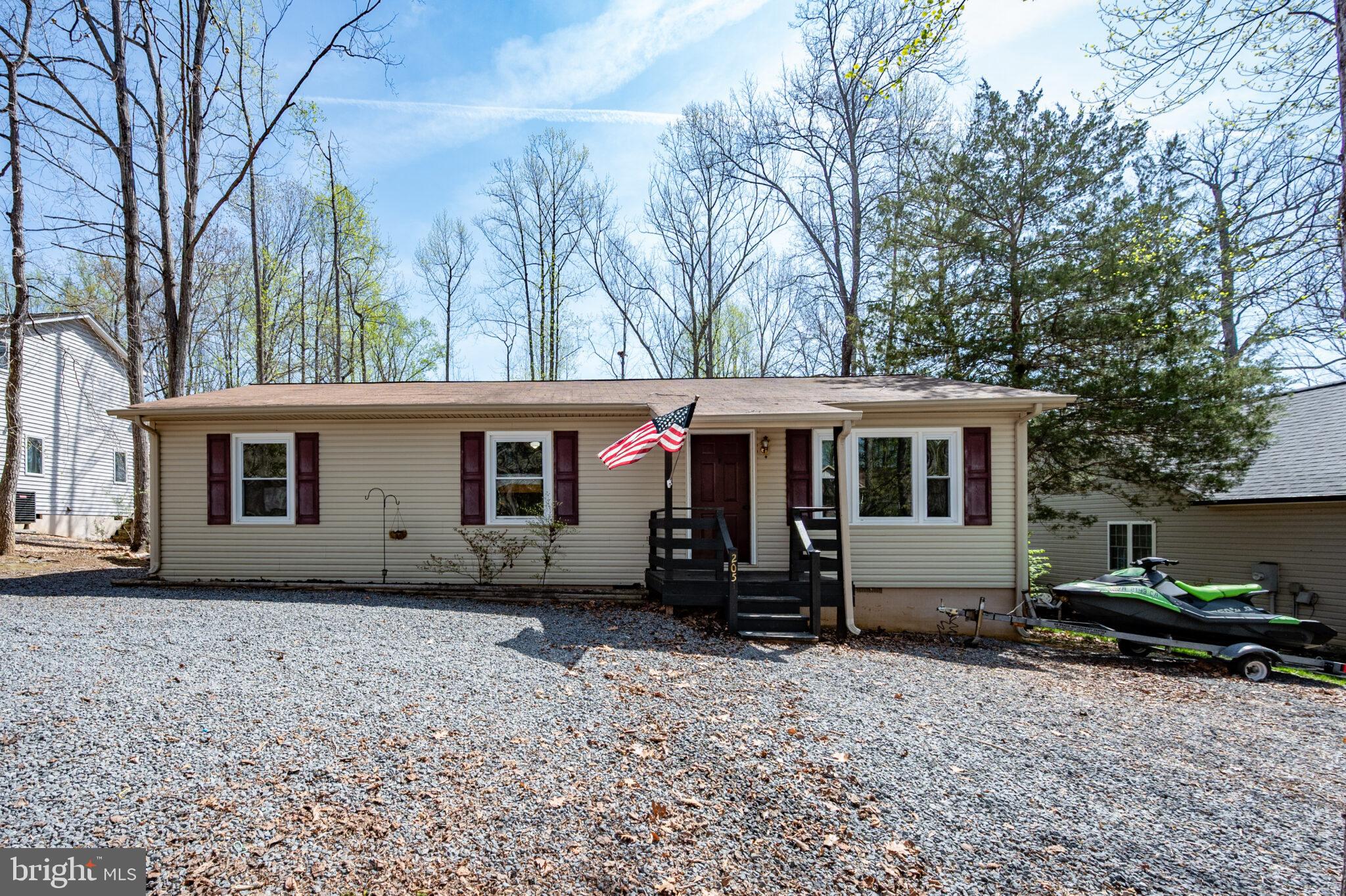 205 Monument Road Locust Grove, VA 22508 - Photo 2 of 49 a view of a house with backyard