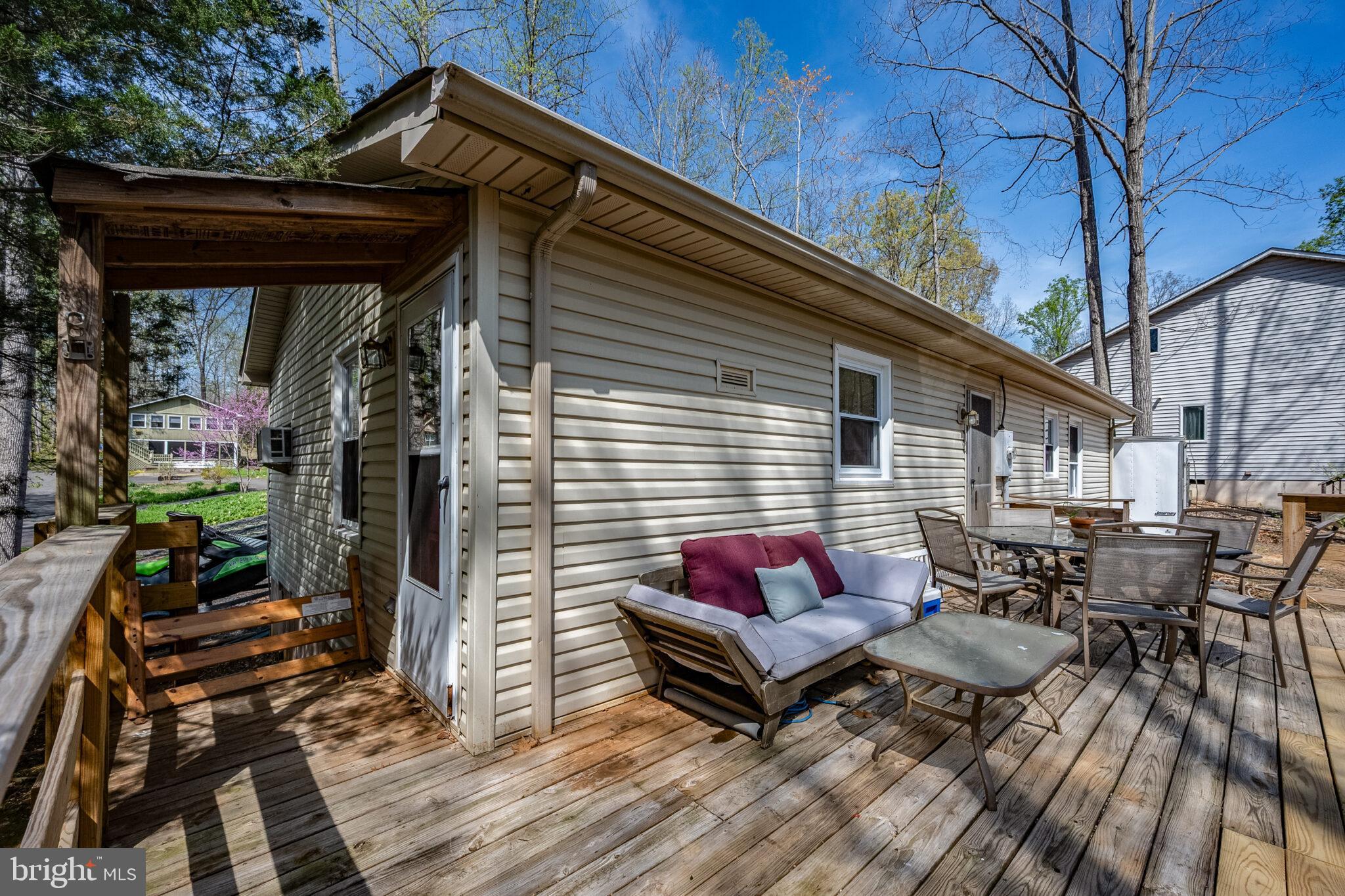 205 Monument Road Locust Grove, VA 22508 - Photo 23 of 49 a backyard of a house with seating space