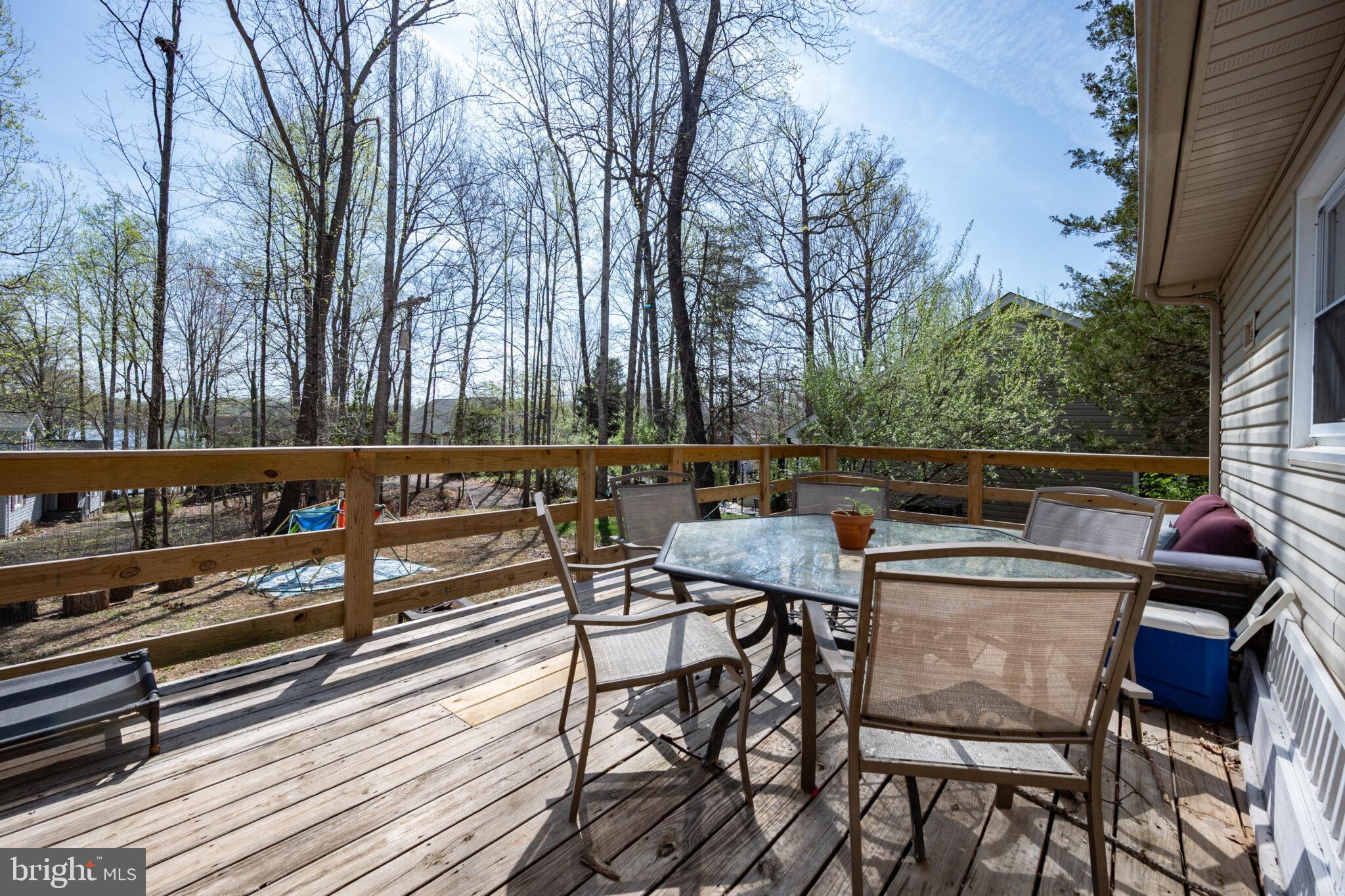 205 Monument Road Locust Grove, VA 22508 - Photo 25 of 49 a view of a chairs and table on the wooden floor
