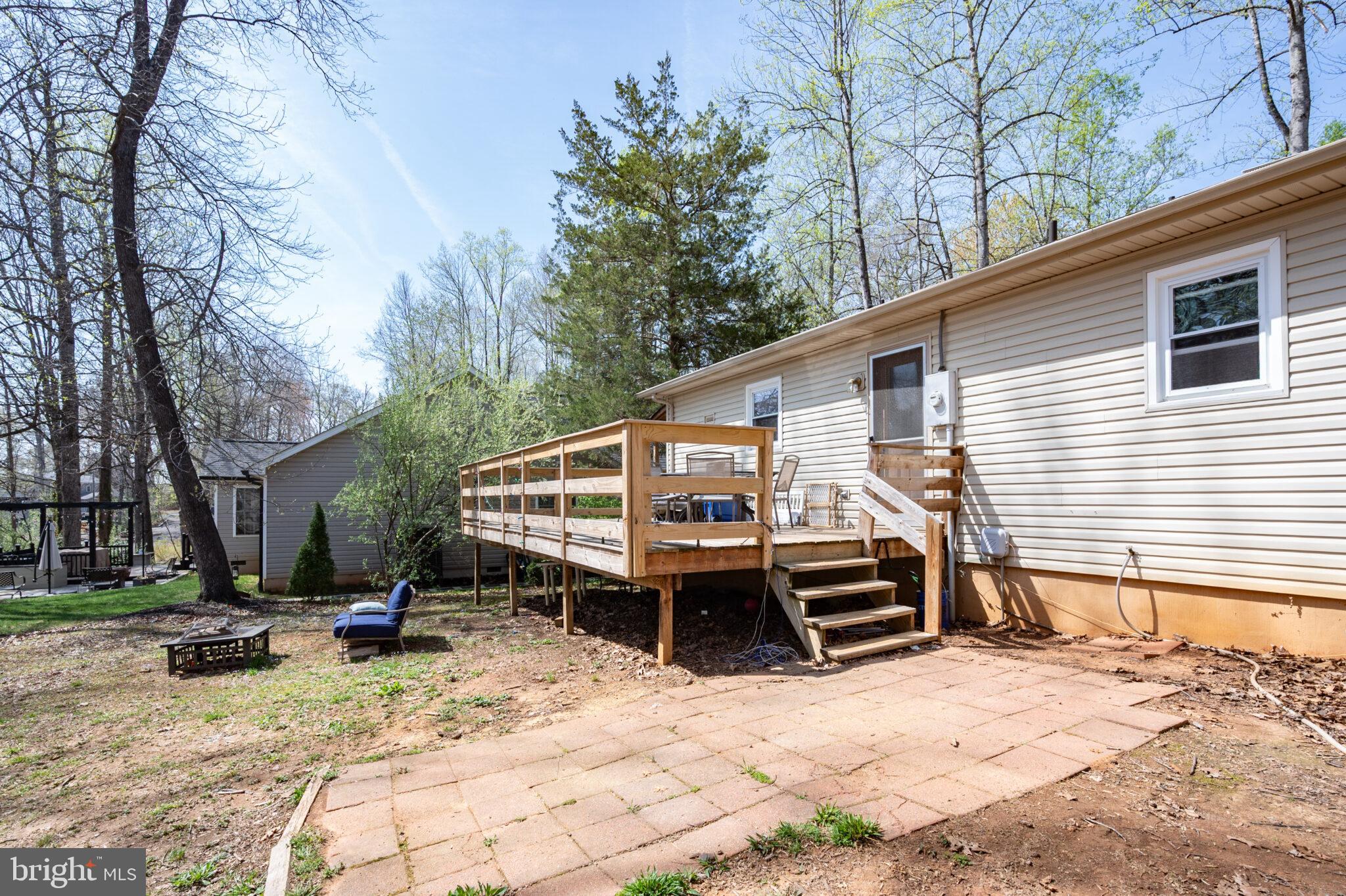 205 Monument Road Locust Grove, VA 22508 - Photo 26 of 49 a view of a house with a yard and furniture