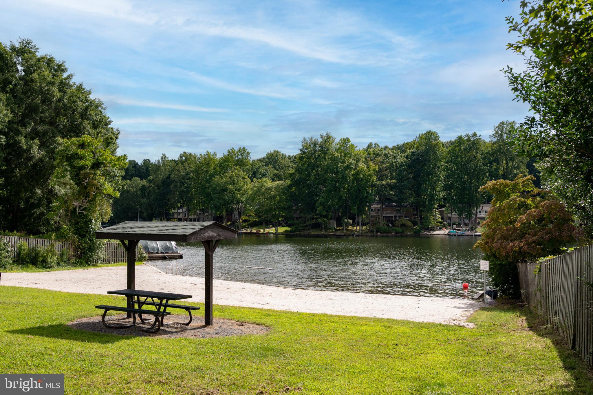 205 Monument Road Locust Grove, VA 22508 - Photo 33 of 49 a view of a lake with a yard