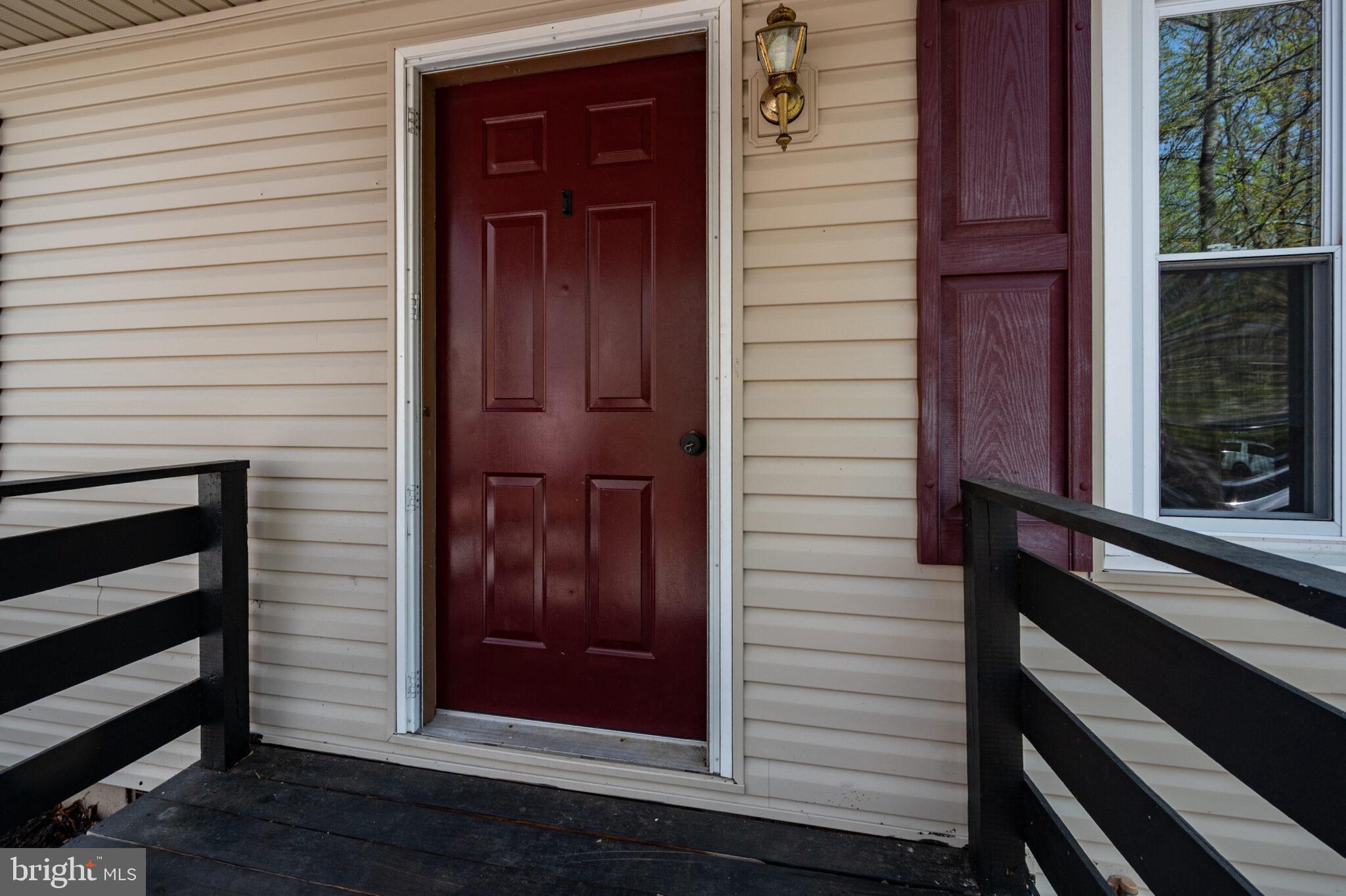205 Monument Road Locust Grove, VA 22508 - Photo 4 of 49 a view of front door of a house