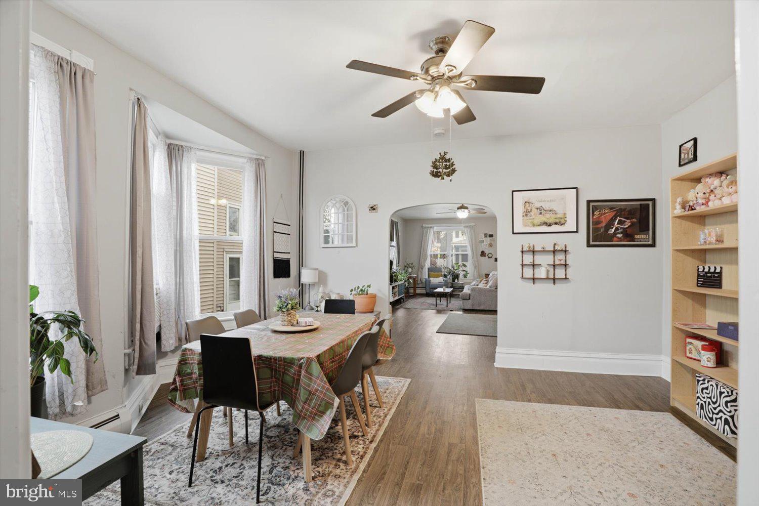 133 West High Street Manheim, PA 17545 - Photo 11 of 36 a view of a dining room with furniture and a livingroom