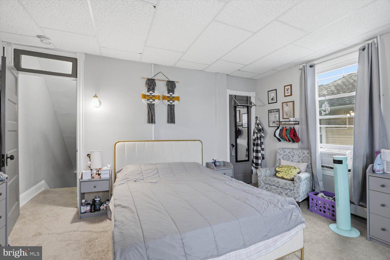 133 West High Street Manheim, PA 17545 - Photo 22 of 36 a bedroom with a bed and a window
