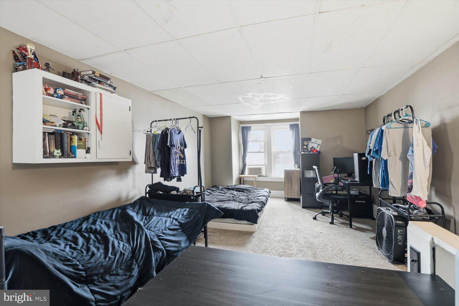 133 West High Street Manheim, PA 17545 - Photo 27 of 36 a bedroom with furniture and wooden floor