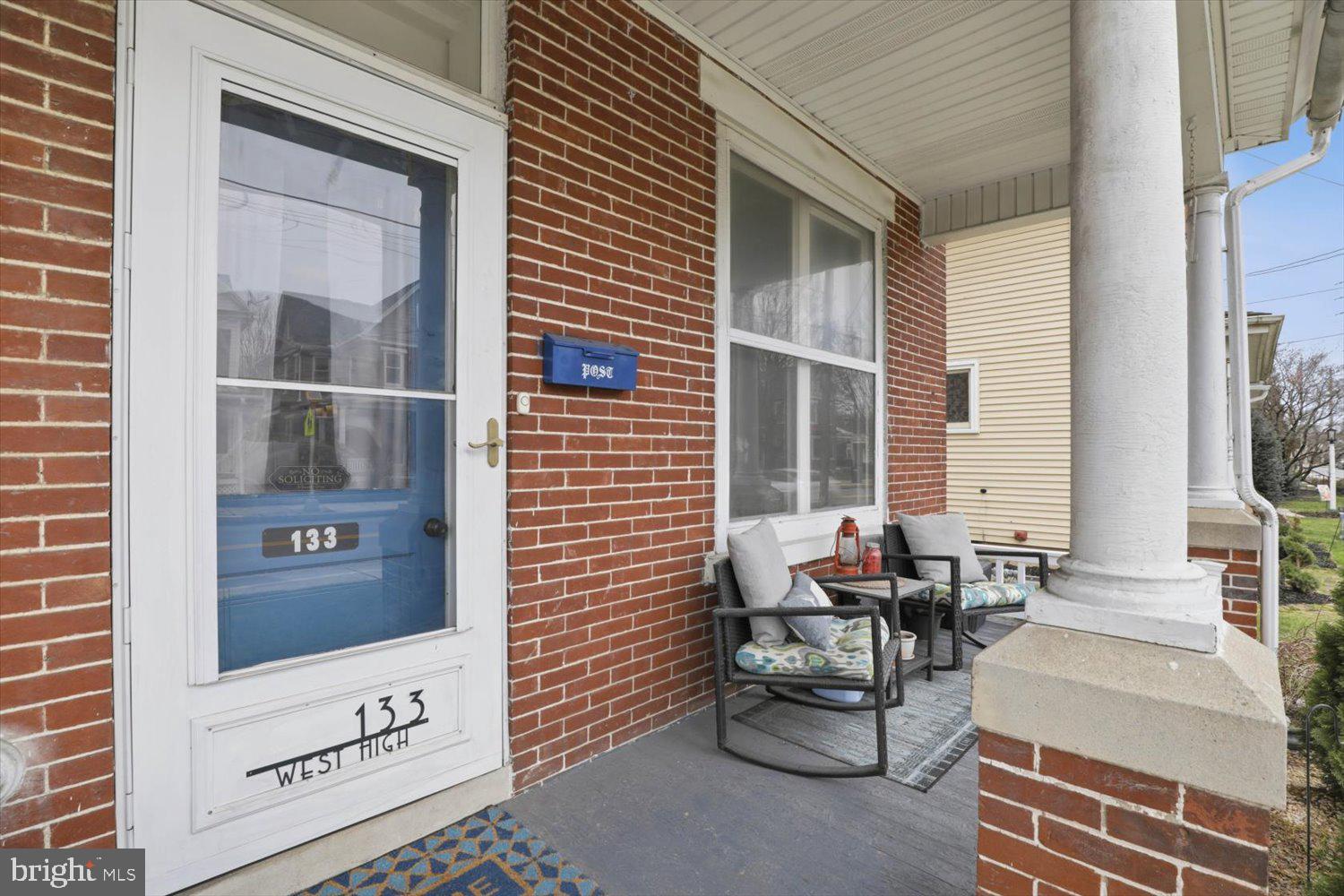 133 West High Street Manheim, PA 17545 - Photo 4 of 36 a balcony with couches and white walls