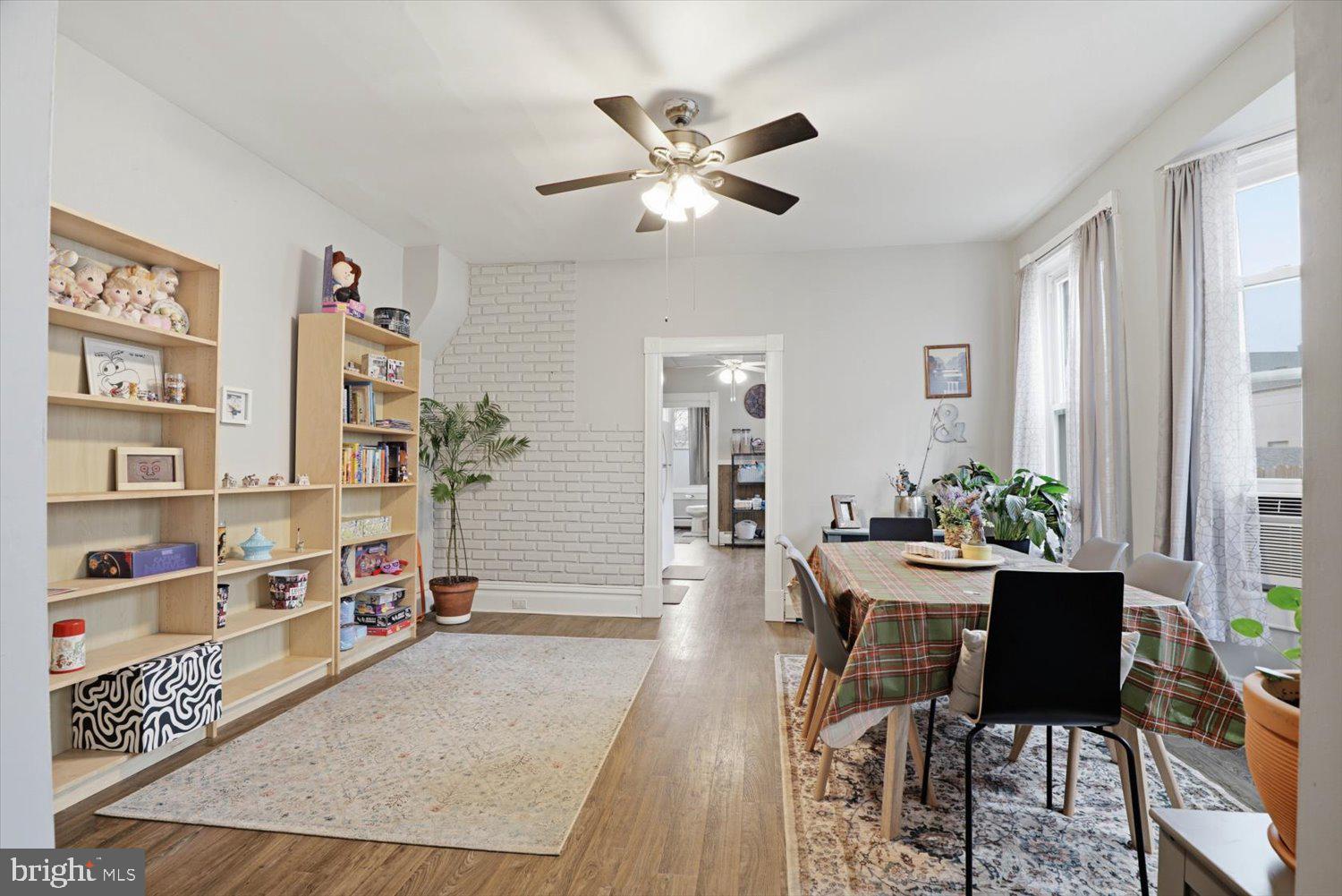 133 West High Street Manheim, PA 17545 - Photo 10 of 36 a view of a livingroom with furniture and a bookshelf