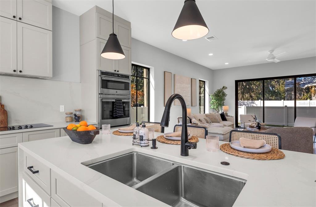 529 West Princeton Street Orlando, FL 32804 - Photo 13 of 50 a kitchen with a sink and appliances