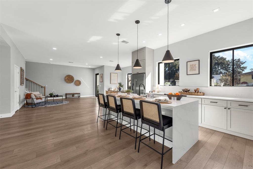 529 West Princeton Street Orlando, FL 32804 - Photo 17 of 50 a large kitchen with a table and chairs