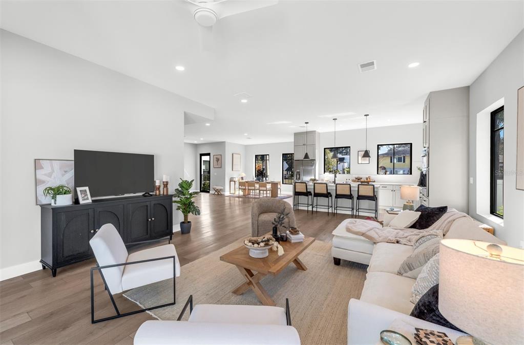 529 West Princeton Street Orlando, FL 32804 - Photo 23 of 50 a living room with furniture and a flat screen tv