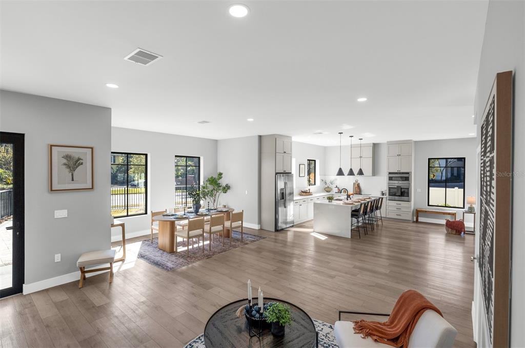 529 West Princeton Street Orlando, FL 32804 - Photo 24 of 50 a living room with furniture and wooden floor
