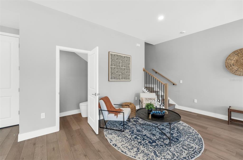529 West Princeton Street Orlando, FL 32804 - Photo 28 of 50 a living room with furniture and wooden floor