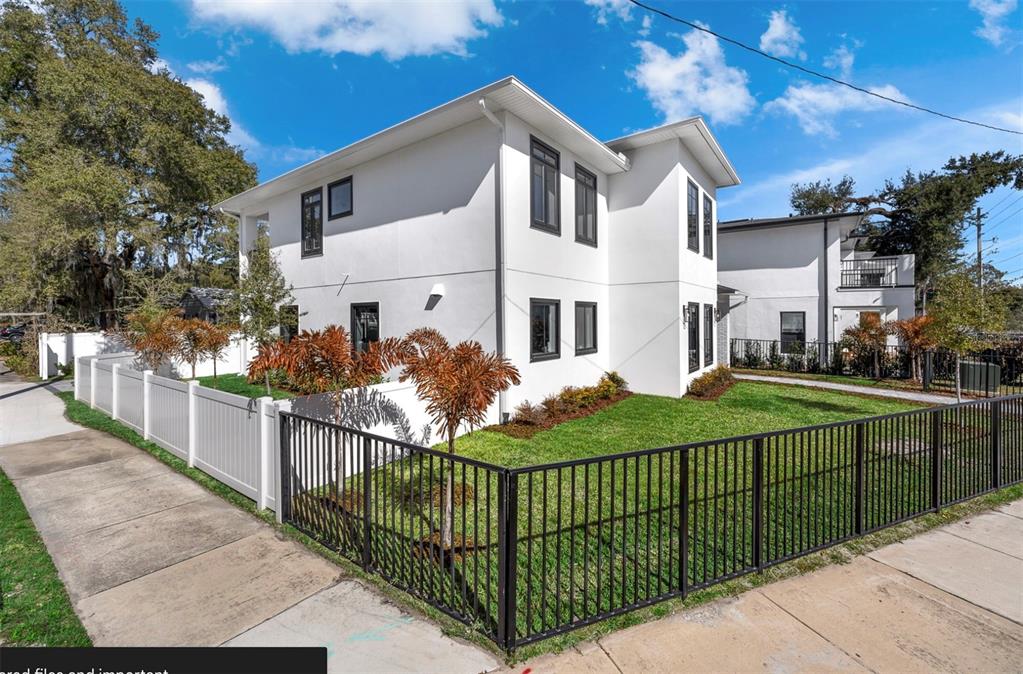 529 West Princeton Street Orlando, FL 32804 - Photo 4 of 50 a view of a wrought iron fences in front of house