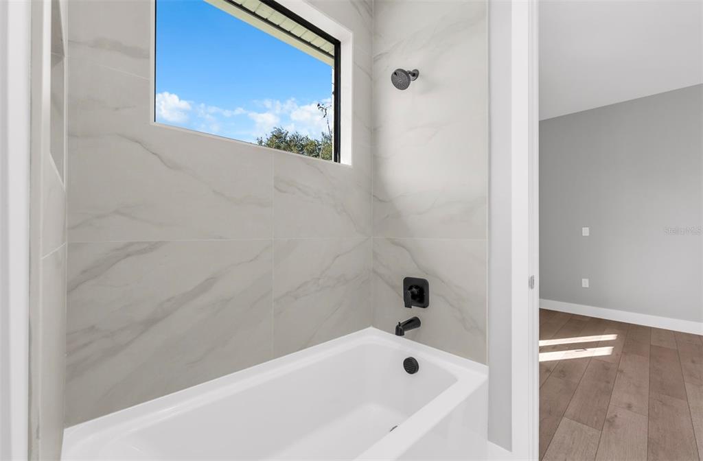 529 West Princeton Street Orlando, FL 32804 - Photo 41 of 50 a bathroom with a bathtub