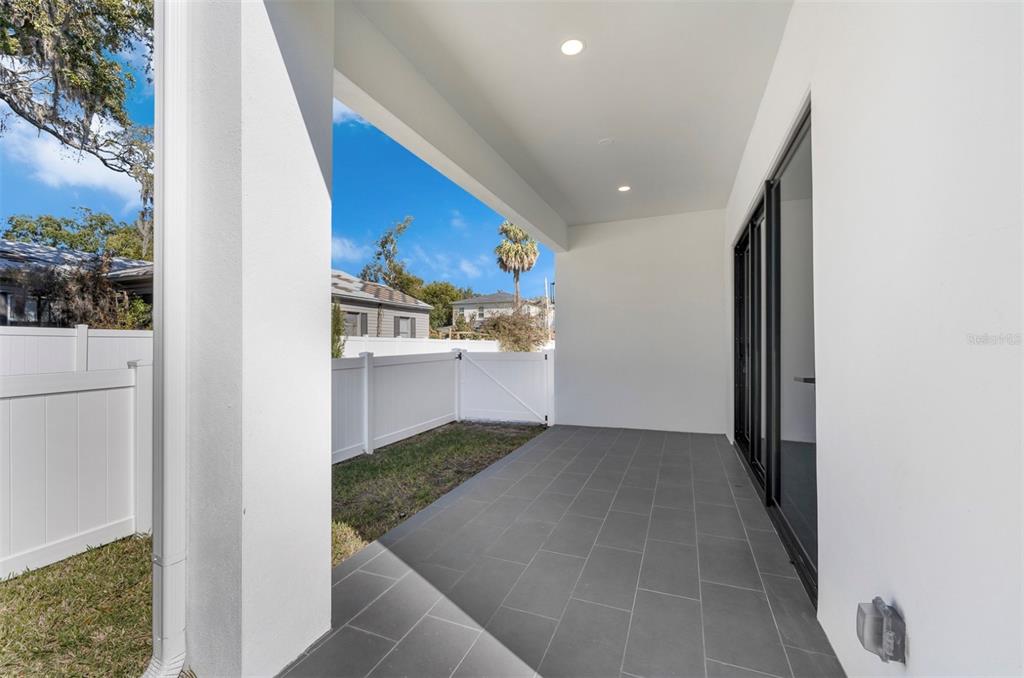 529 West Princeton Street Orlando, FL 32804 - Photo 7 of 50 a view of a hallway with wooden floor and entryway