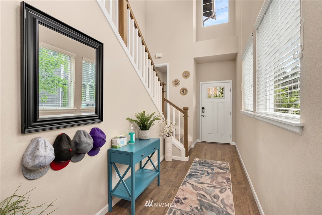 3 159th Place Southeast Bothell, WA 98012 - Photo 3 of 27 a hallway with a window and couch