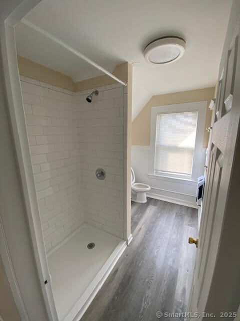 108 Washington Street Wallingford, CT 06492 - Photo 8 of 11 a bathroom with a bathtub and a shower