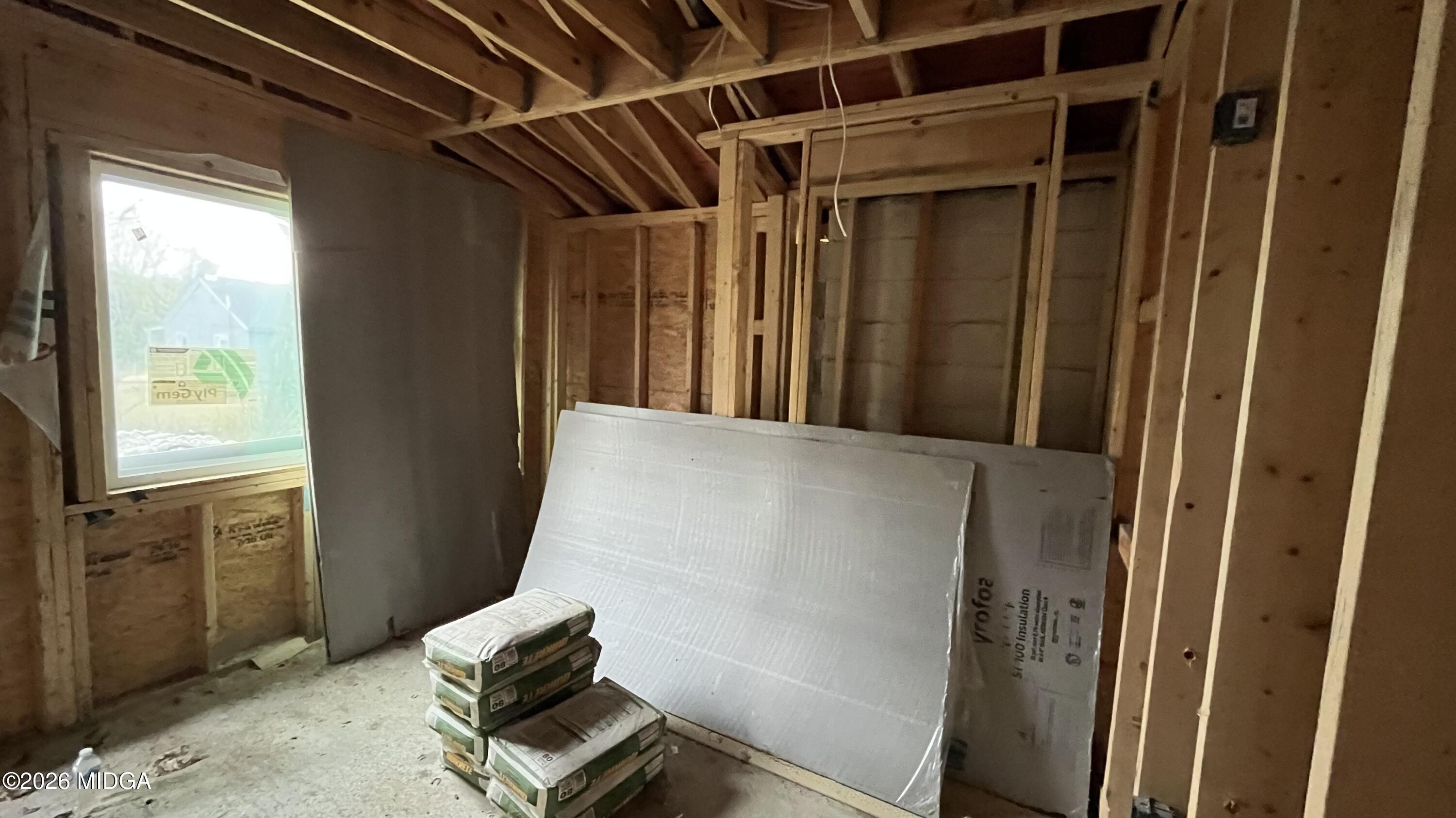 3372 Ada Street Macon, GA 31206 - Photo 6 of 10 a view of a hallway with wooden floor and stairs