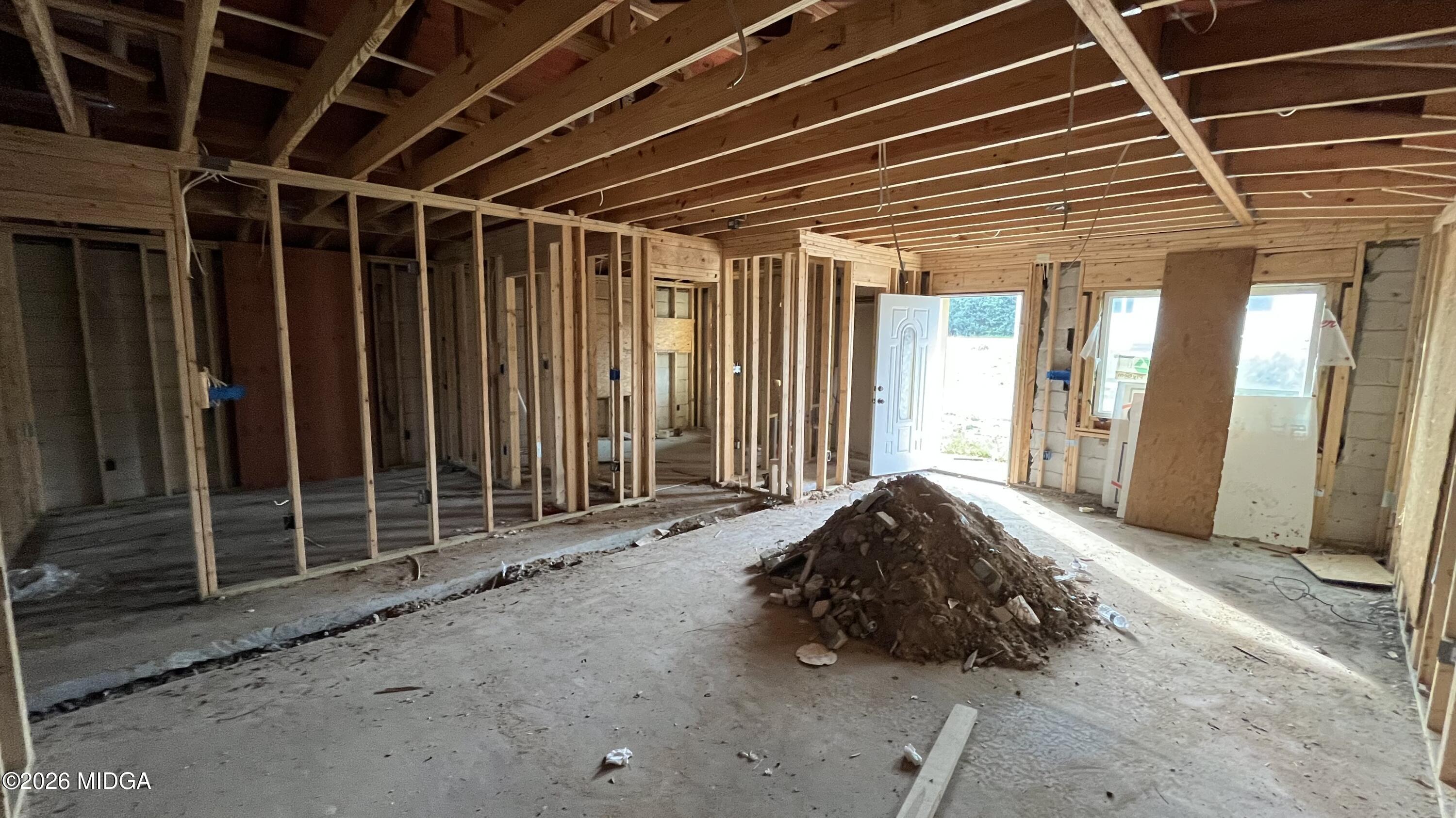 3372 Ada Street Macon, GA 31206 - Photo 9 of 10 a bedroom with a bed and a large window