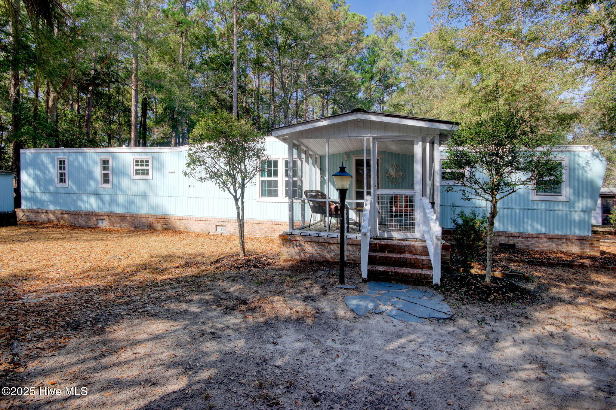 9161 Riveredge Place Southwest Calabash, NC 28467 - Photo 1 of 30 Charming retreat at the end of a quiet cul-de-sac.