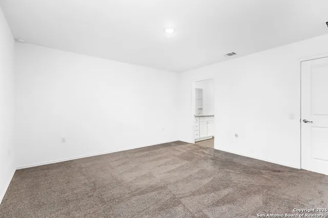 an empty room with an entryway