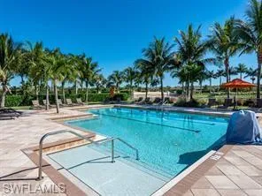 a view of swimming pool with a patio