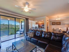9723 Acqua Court, Unit 332 Naples, FL 34113 - Photo 3 of 23 a living room with furniture and a large window