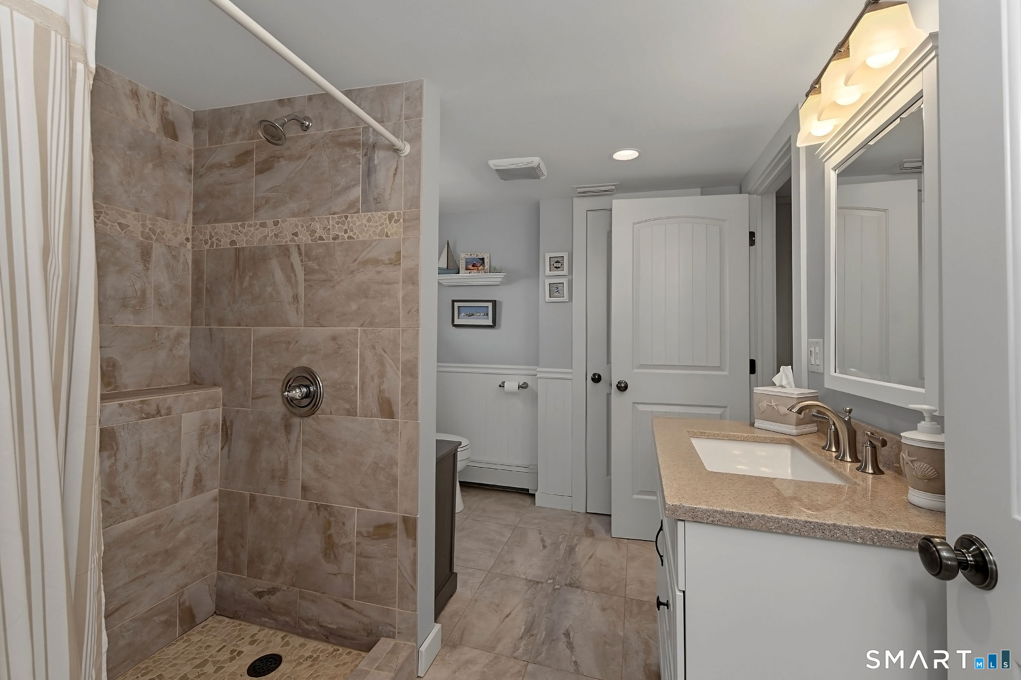 3 Mohican Road West Westbrook, CT 06498 - Photo 29 of 40 Bathroom has an entry to the primary and the main hallway