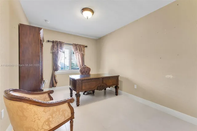 a view of a workspace with furniture