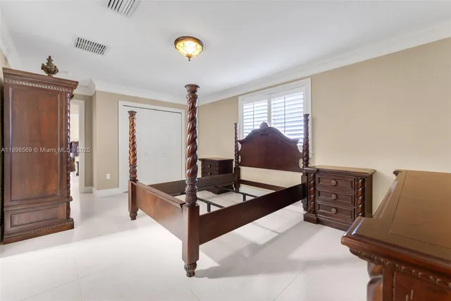 a bathroom with a granite countertop sink a mirror a vanity and bathtub