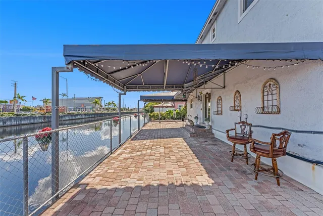 a view of a porch with furniture