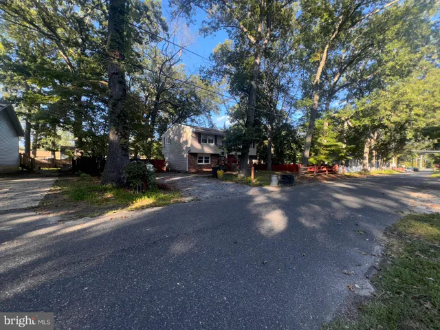 a view of road with trees