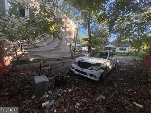 a view of a backyard with sitting area