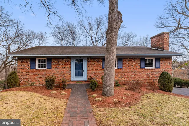 a front view of a house with yard