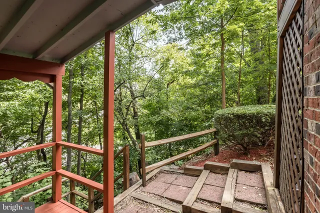 a view of a two chairs in the balcony