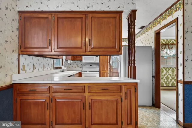 a view of a livingroom with wooden floor