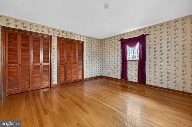 an empty room with window