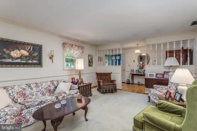 a living room with furniture and a couch