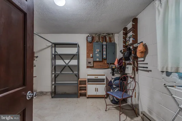 a bathroom with a sink toilet and mirror