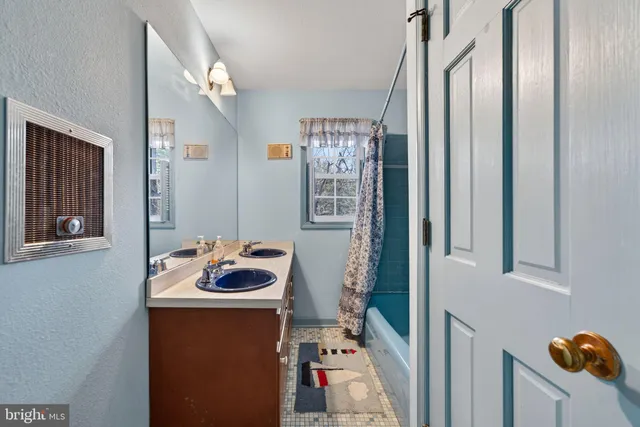 a view of livingroom with an empty room