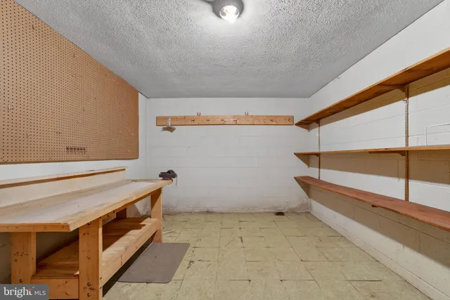 a spacious bathroom with a double vanity sink a large mirror and a bathtub