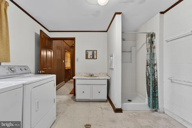 a view of a balcony with wooden floor