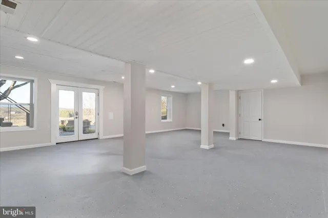 an empty room with windows