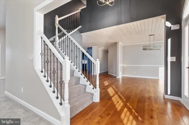 a view of entryway with wooden floor