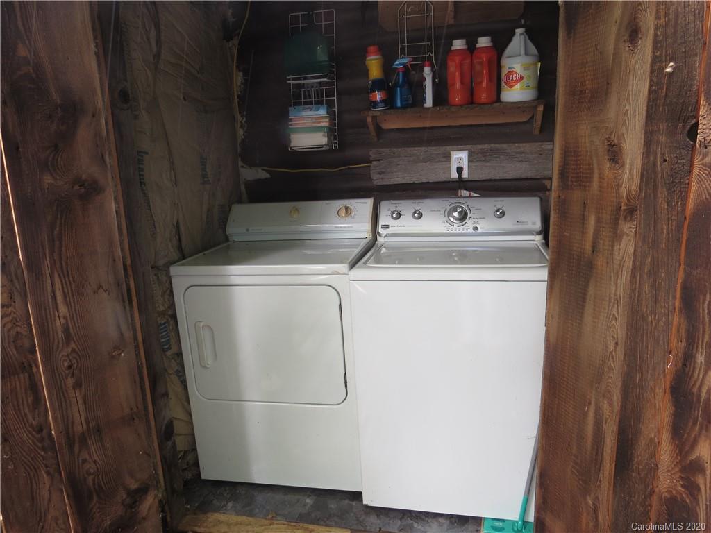 142 Cold Spring Road Burnsville, NC 28714 - Photo 24 of 34 a utility room with dryer and washer
