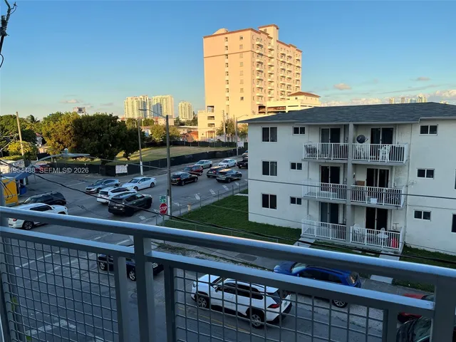 a front view of a building with glass windows