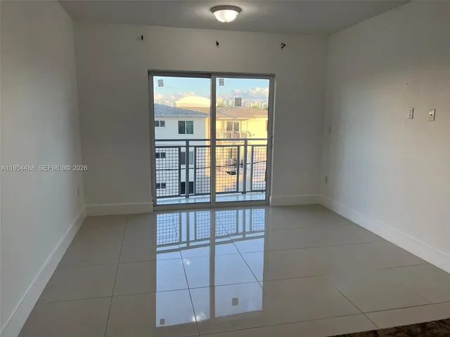 a view of cabinets and window