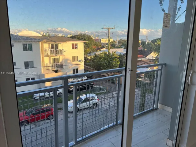 a view of a living room with furniture