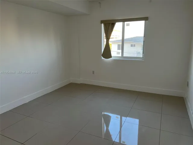 an empty room with a window