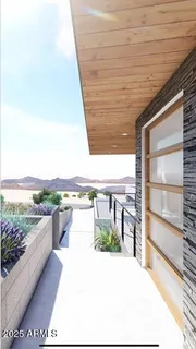 a view of balcony with furniture